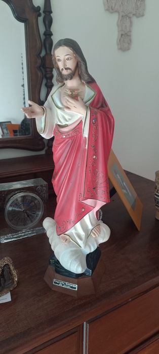 Imagem coração segurado Jesus" olhos em vidro"