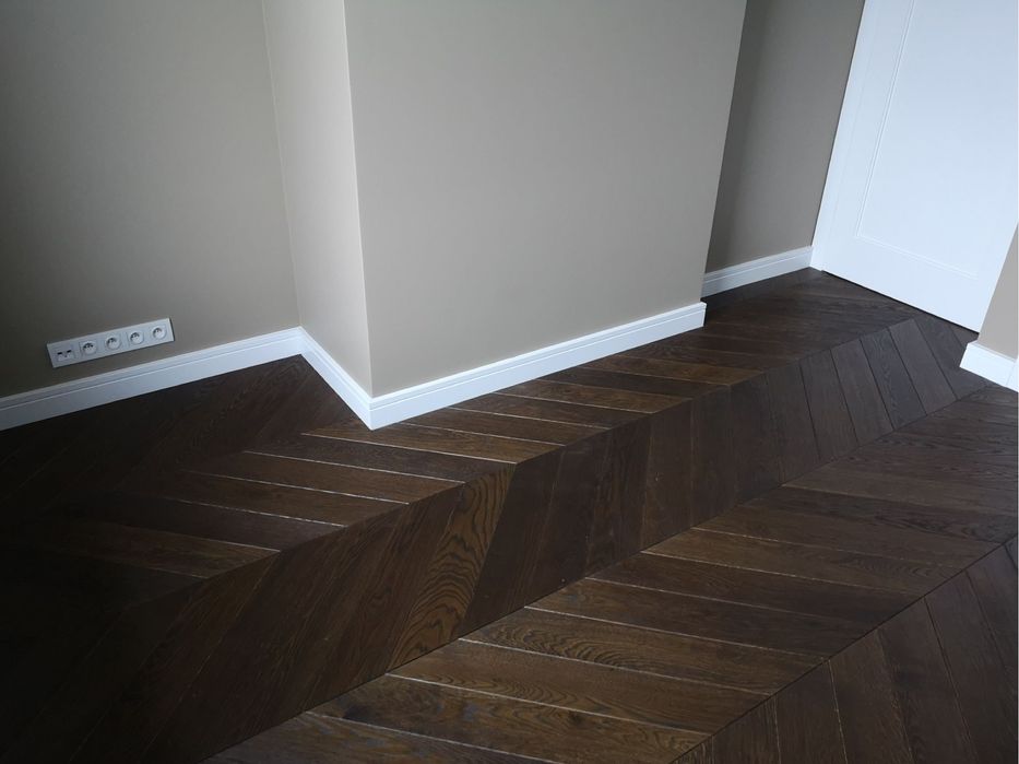 Montaż układanie paneli podłogowych desek Barlinek.