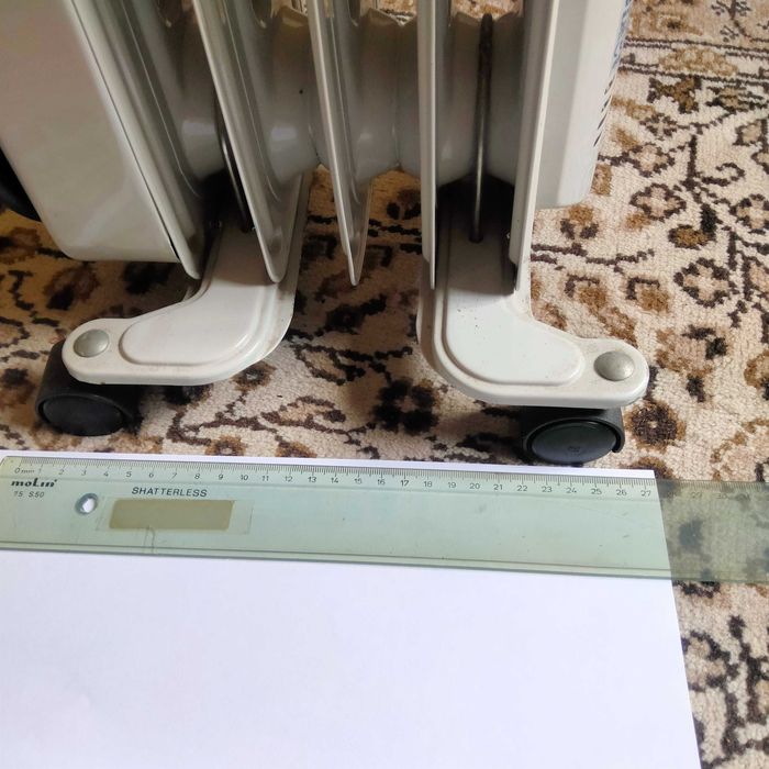 AQUECEDOR  a óleo TAURUS  DALOA  1200, praticamente novo.