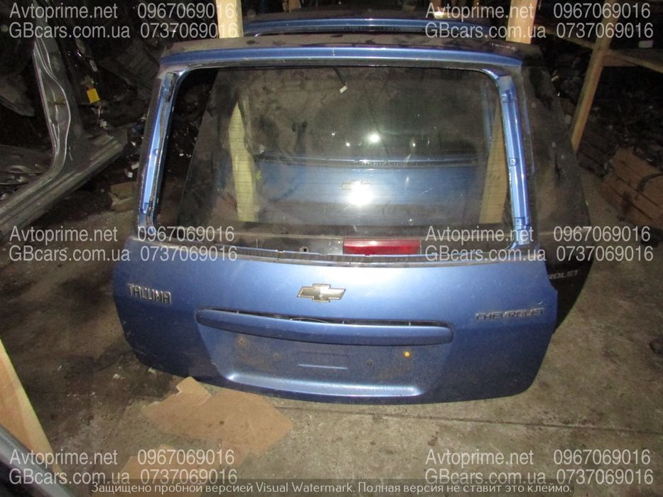 Комплект кришка багажніка ліхтар бампер задній Шевроле такума ta