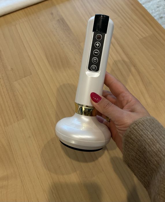 Massajador elétrico com ventosaterapia