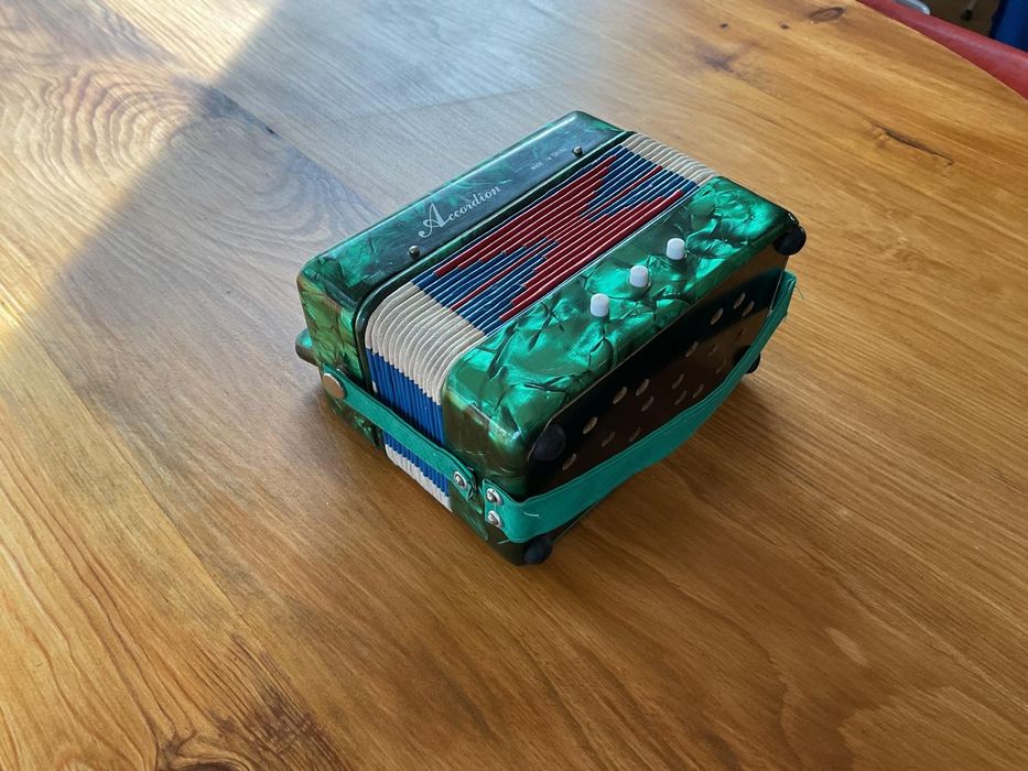 Mini acordion portátil