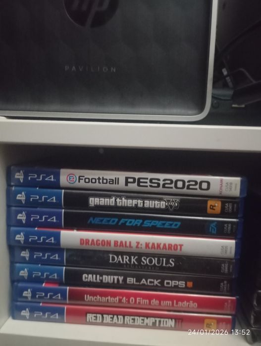 Consola PlayStation 4 Pro 1TB, 2 comandos  e 8 jogos