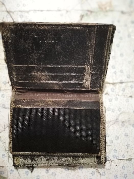 Vendo carteira de homem bom estado