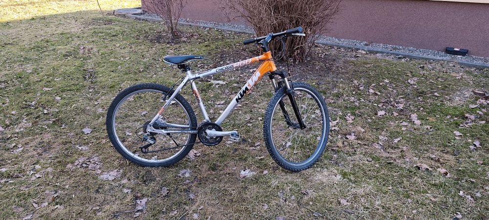 Rower srebrno-pomarańczowy  KTM
