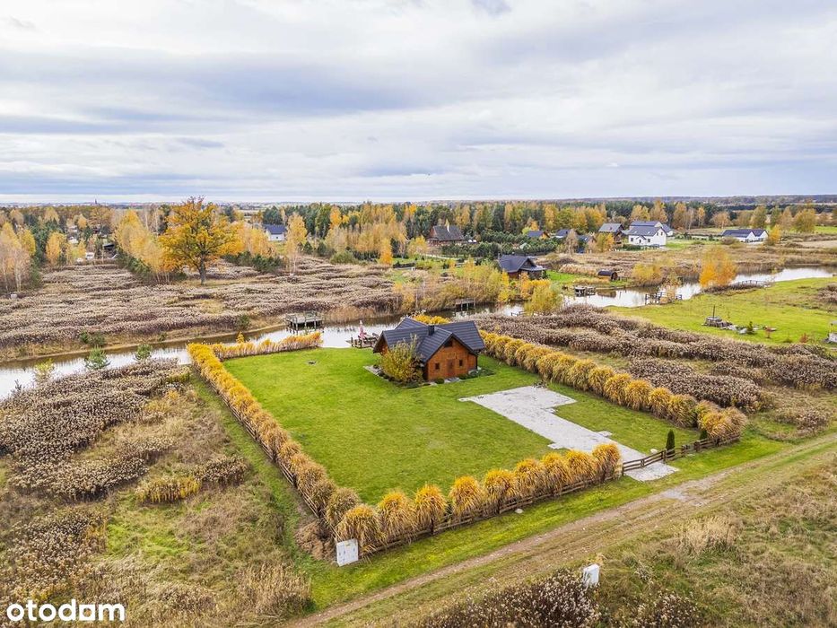 Drewniany dom z prywatnym stawem i pierwszą linią brzegową!