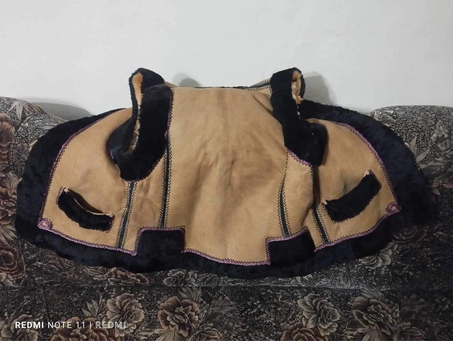 Кептар,кожуш та постоли.