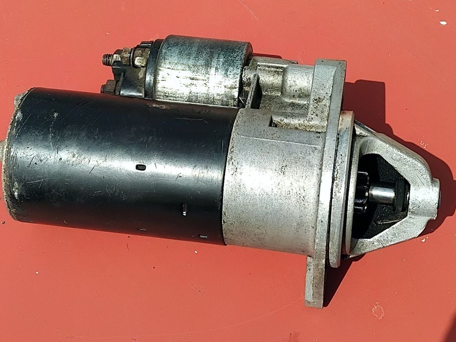 Стартер на кадет 1.8