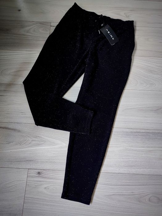 Nowe spodnie srebrna nitka 36/38