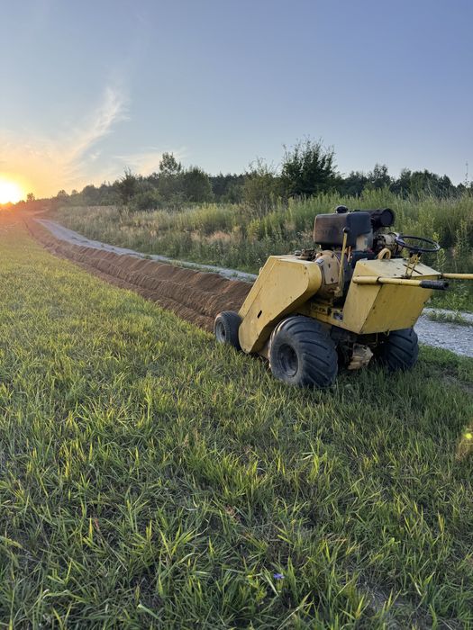 Wykopy liniowe, przyłacza elektryczne, uslugi koparką łańcuchową, odwodnienia, kanalizacja, gaz