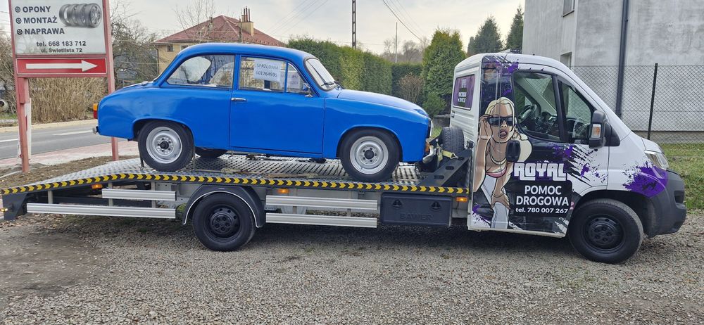 Pomoc Drogowa Holowanie Transport Wymiana koła Odpalanie samochodów