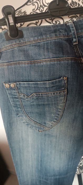 Jeansy damskie Clockhouse