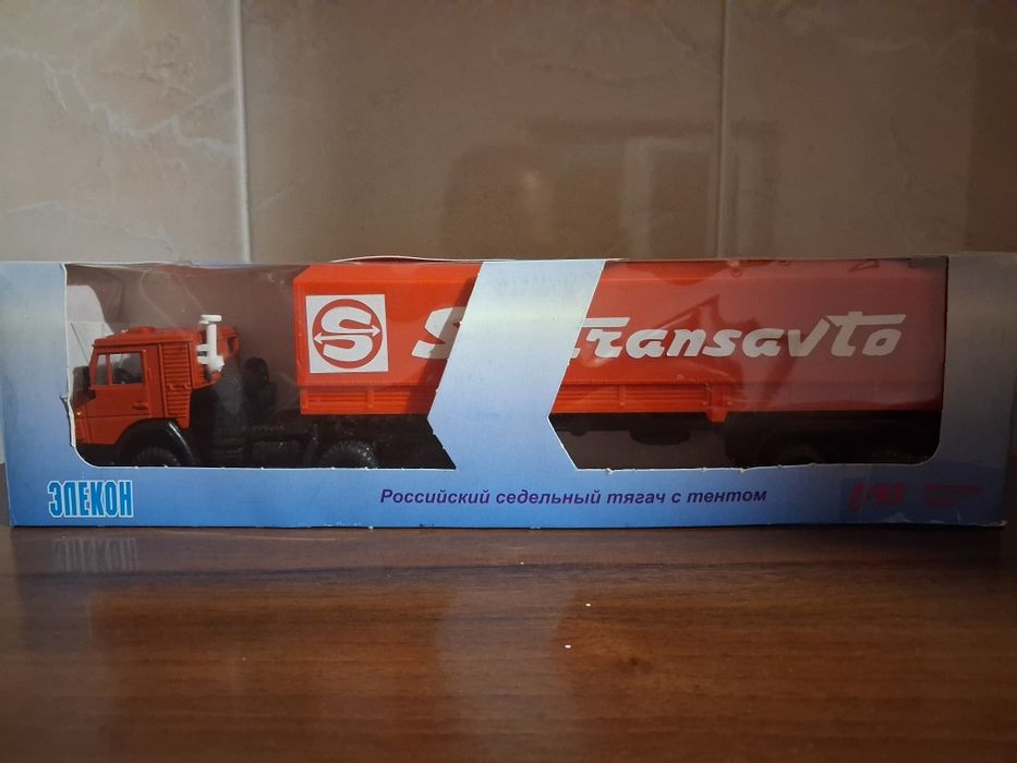 Камаз 5410 с п/п и тентом.Новый,целый.1/43