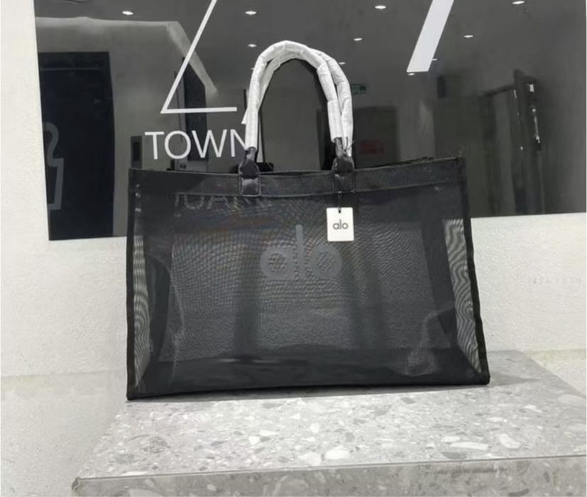 Крутезна чорна прозора сумка шопер від бренду alo