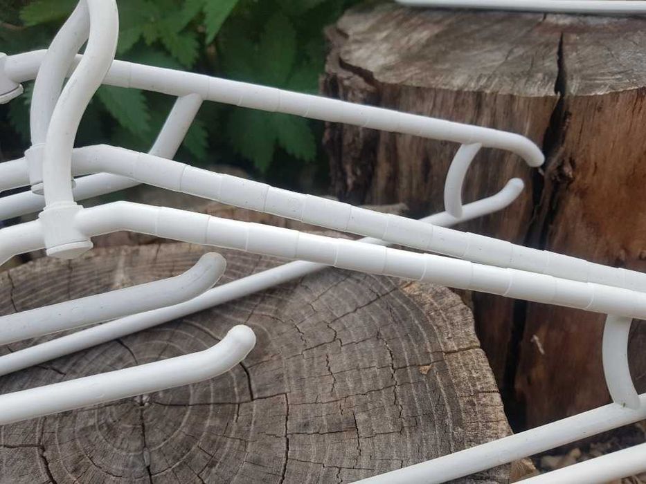 Białe wieszaki odzieżowe obrotowe z antypoślizgiem 100 szt.