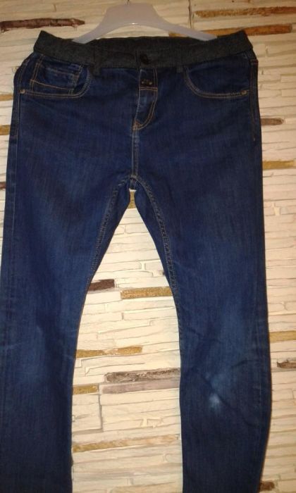 Spodnie jeans 164