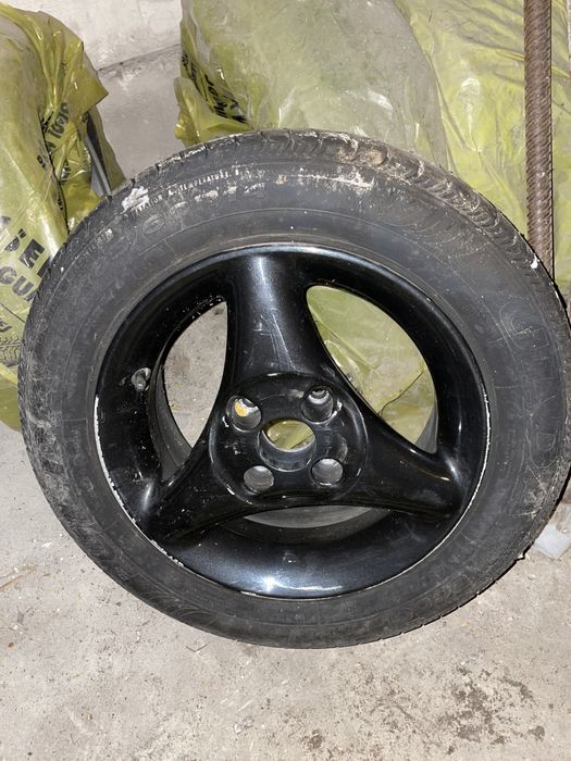 Felgi aluminiowe z oponami letnimi 4 szt 185/60 R14 Volkswagen