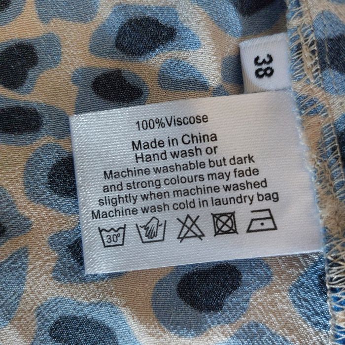 Bluzka o kroju oversize 38/40/42 z rozszerzanymi rękawami