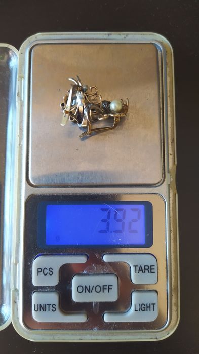 Brincos de ouro com prata