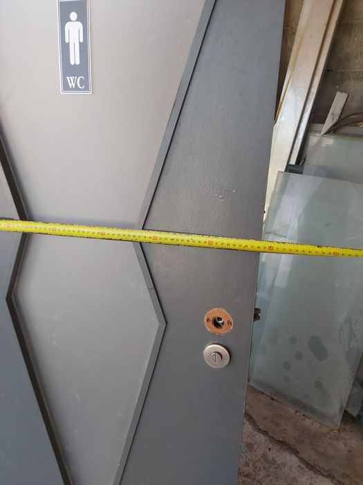 Portas de  WC masculino e feminino