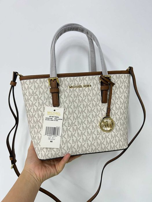 Жіноча сумка Michael Kors jet set travel білого кольору