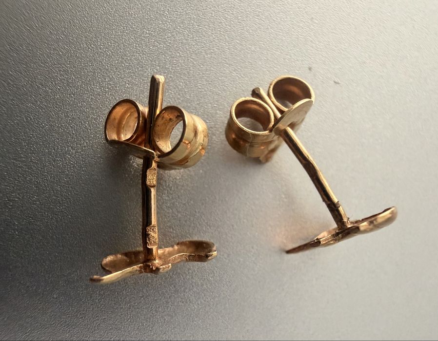 Par de brincos "elefantes" ouro