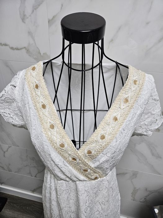 Vestido branco de renda estilo boho