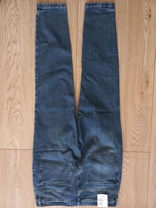 Nowe spodnie Reserved Carrot Slim 31