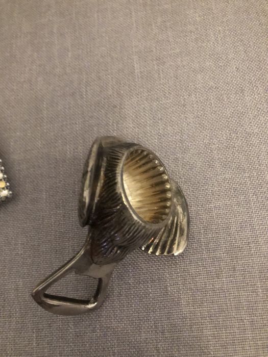 Abre capsulas garrafas