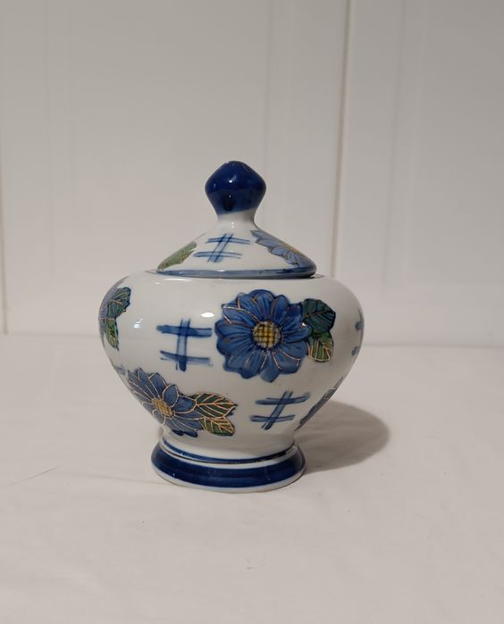 White Porcelain Jar with Blue Flowers and Gold Accents