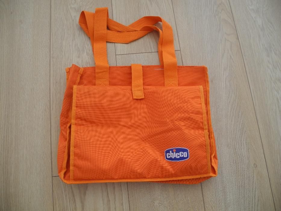 Troca fraldas de viagem Chicco cor de laranja