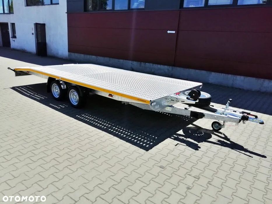 Besttrailers Laweta samochodowa REBEL (Jupiter) 5,0 x2,1 2700 kg przyczepa ze skosem PRODUCENT  Laweta REBEL, Model BEST, 5,0x2,1m 2700 kg, ALU RYFEL, 2 OSIE, R13C