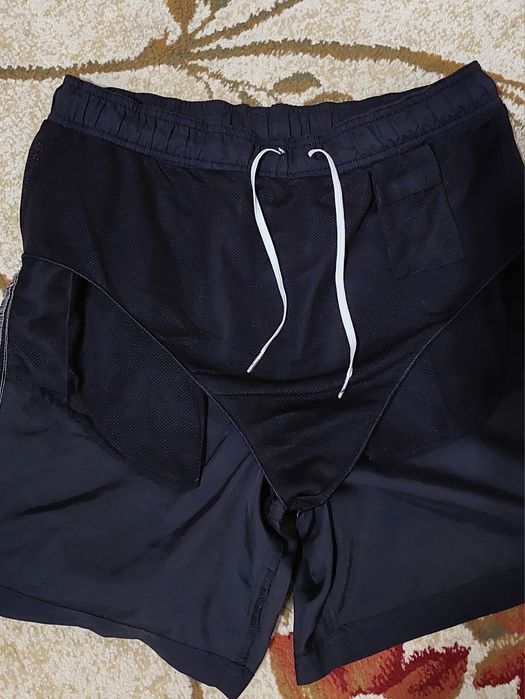 Фирменные шорты PUMA