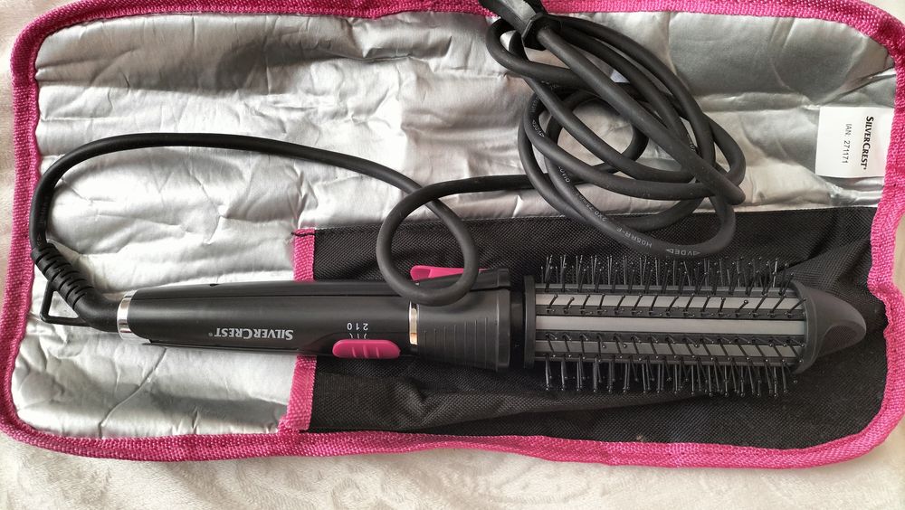 Escova modeladora elétrica nova