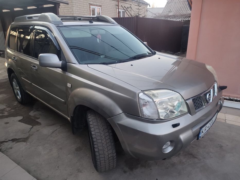 Nissan.   X Trail
