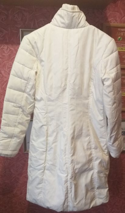 Женский пуховик .