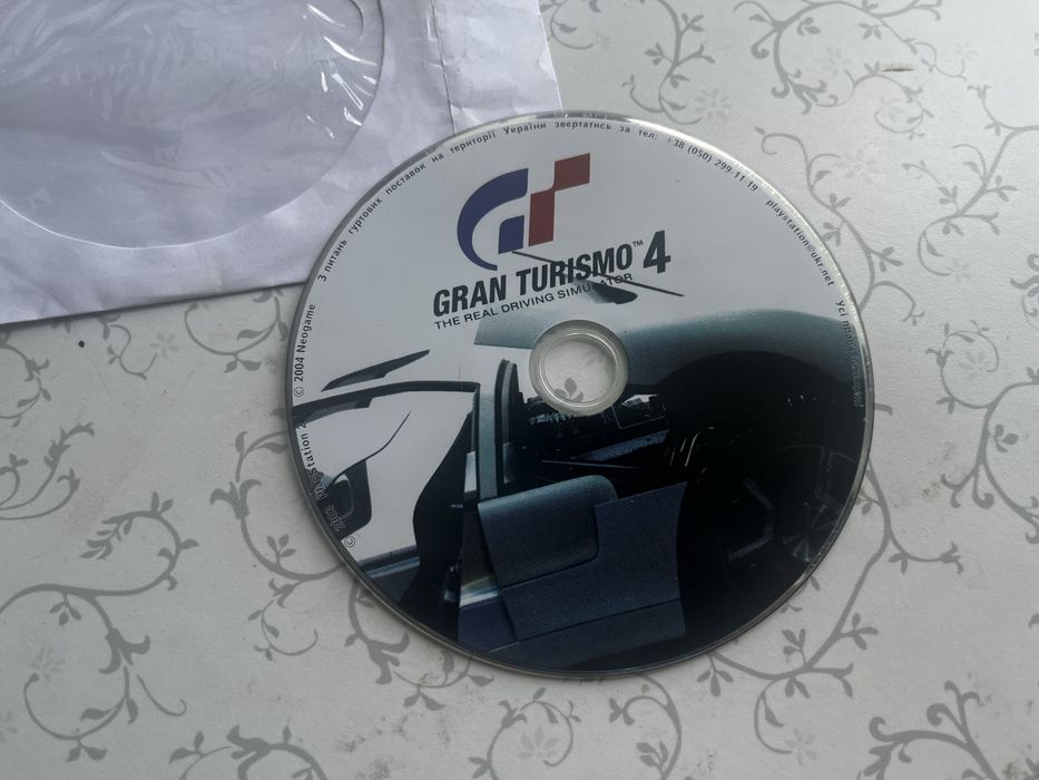 Gran Turismo 4 , sony playstation 2.