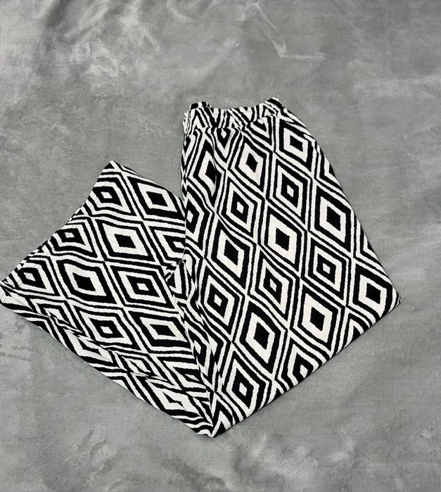 Eleganckie spodnie damskie L – czarno-biały wzór geometryczny, 1