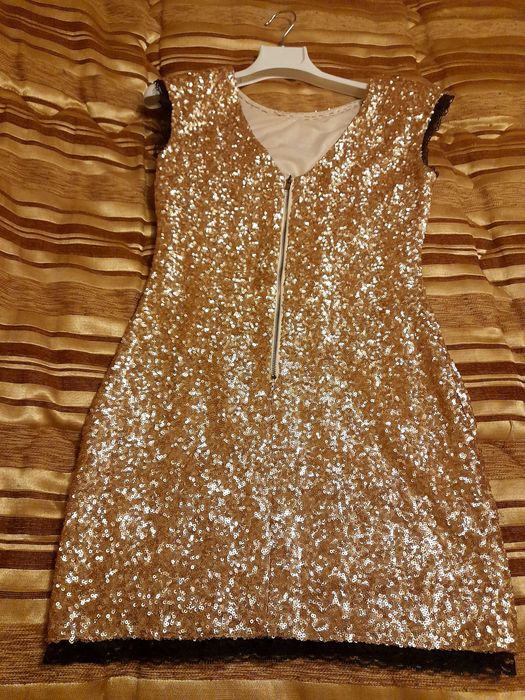 Vestido dourado e preto com elestano S