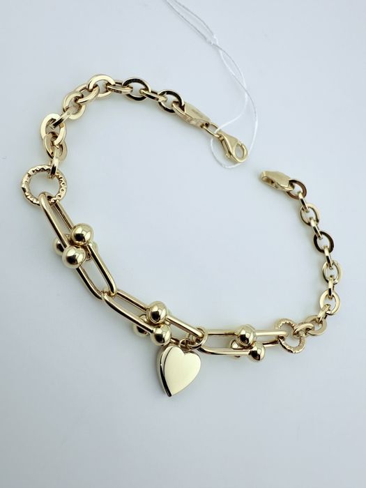 Золотий браслет новий