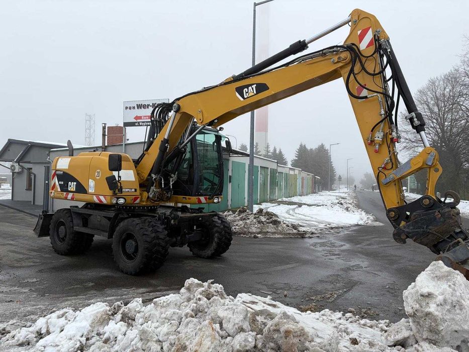 Sprzedam koparkę kołową CAT 313D, 2014r., świeżo sprowadzona!