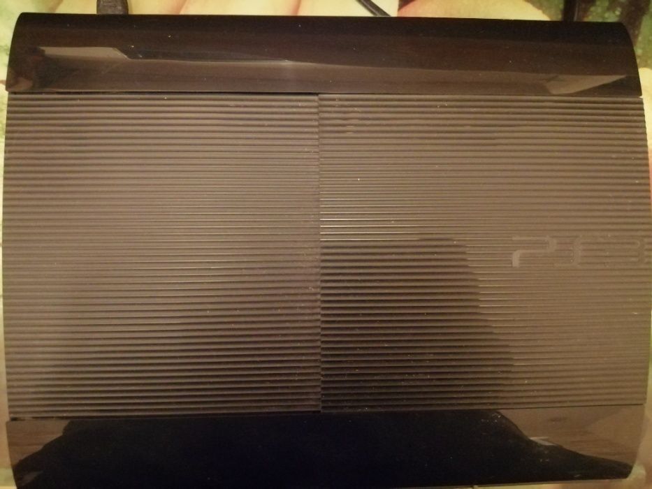 Playstation 3 Super Slim (500GB) +pad+4gry