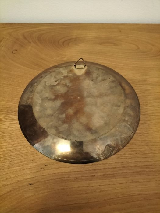 Conjunto de centro de mesa e prato de parede.