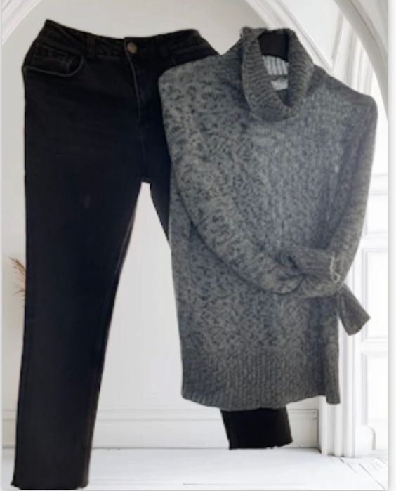 Damskie dżinsy i sweter.