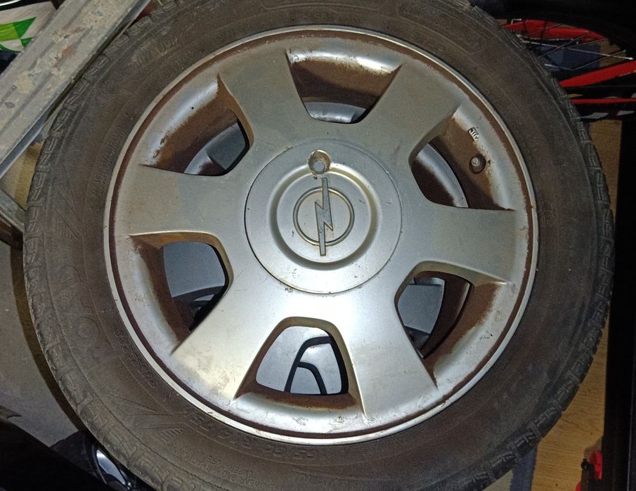 Alufelgi 175/65 R14 14" Cali z oponami Letnie 4x100, Otwor 56,6; z OPEL z deklami
