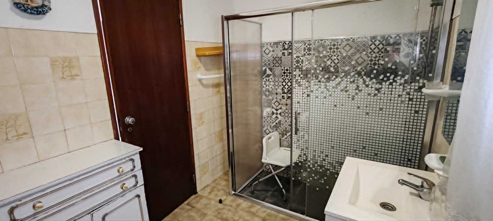 Terreno com Moradia