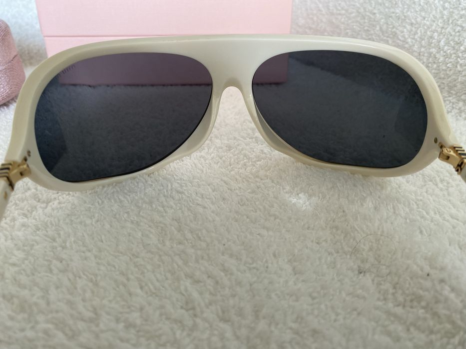 Okulary Miu Miu SMU A01