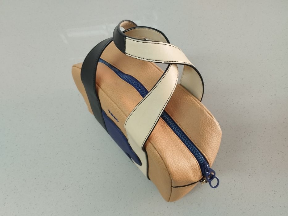 Malote da tous original em pele como nova.