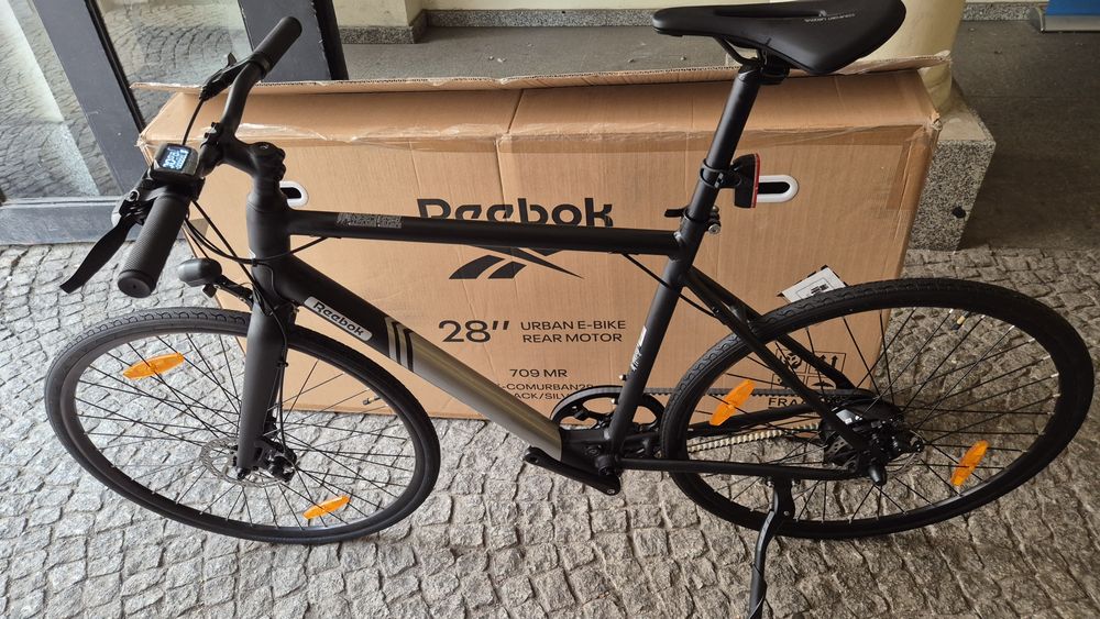 Rower elektryczny Reebok fitness szosa na pasku miejski commuter NOWY