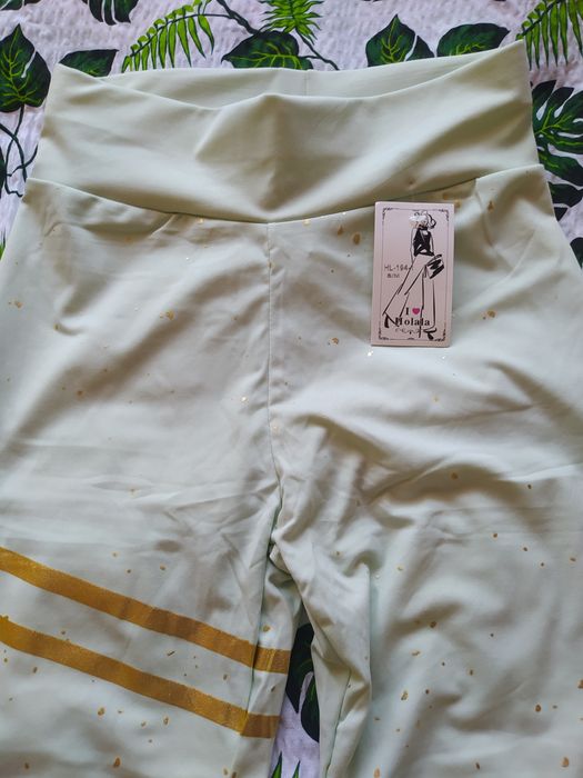 Miętowe legginsy ze złotymi drobinkami s/m